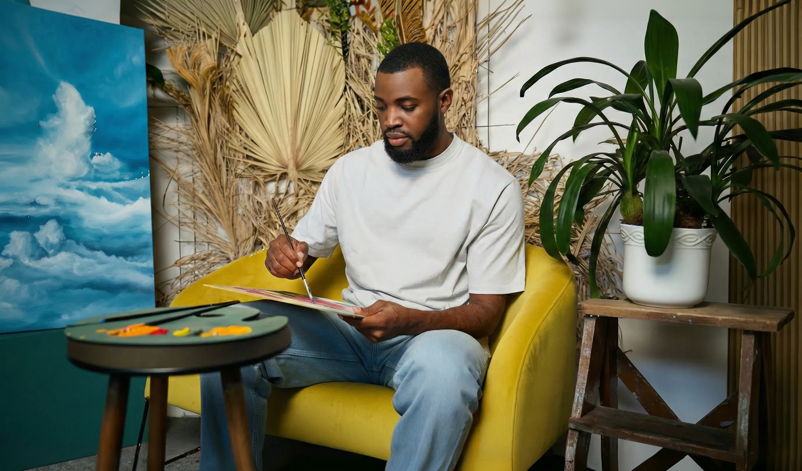 Veek painting in his studio