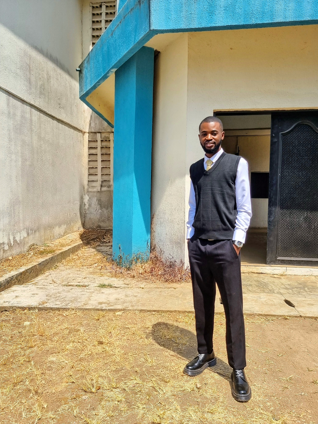 Veek dressed in a suit